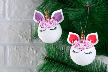 Diy, the unicorn. How to make a unicorn from a Christmas ball toy. Step by step guide photo. Christmas tree decorations.