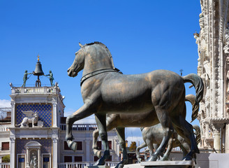 Horses of Saint Mark with Clock Tower in background. Venice, Italy.