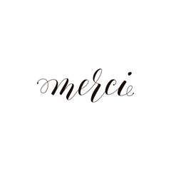 Merci phrase handwritten with a calligraphic brush. Thank you in French. Ink illustration. Modern brush calligraphy. Isolated on white background.