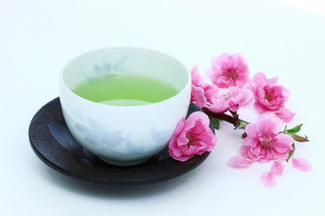 Fototapeta na wymiar 日本茶と桃の花