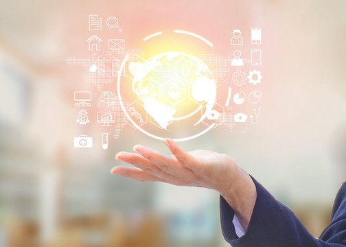 Hand business woman with icon. Hand and world icon over hand.information,World,Internet,technology. Photo Business and digital concept.
