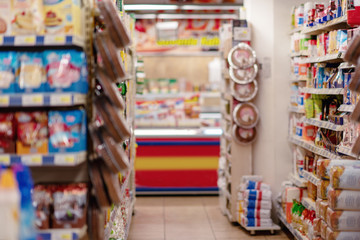 Fototapeta na wymiar Supermarket blur background with bokeh, Miscellaneous Product shelf.