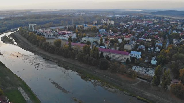 small town panoramic view from above in the autumn during the sunset over the Uzh River Uzhhorod Ukraine Europe