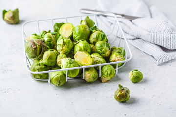 Brussels sprouts raw on a white background, copy space.