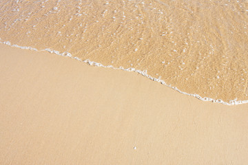 soft wave of the sea on the sandy beach.