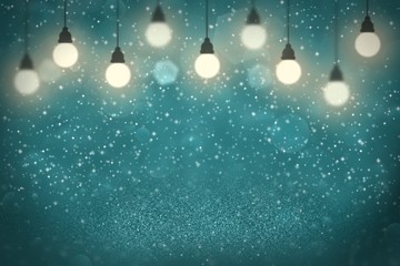 Fototapeta na wymiar light blue fantastic glossy glitter lights defocused light bulbs bokeh abstract background with sparks fly, festival mockup texture with blank space for your content
