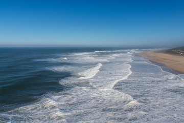 Big atlantic waves at Nazare, Portugal coast.