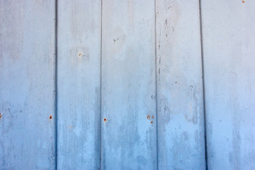 Old wood texture painted blue.