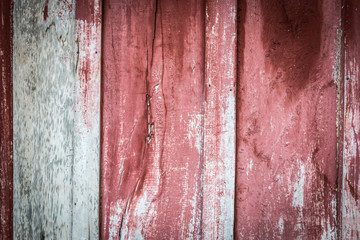 Old wood texture painted red.