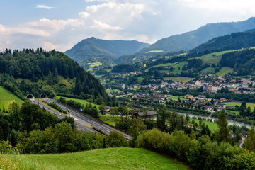 Beautiful view of mountains and entrance to autobahn tunnel near village of Werfen, Austria