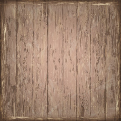 An old brown worn wood board background, texture.Retro wooden background. Old scratched wood texture. Brown boards background.