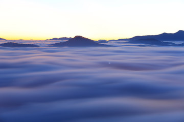 Misty mountain layer at dawn