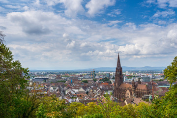 Fototapeta na wymiar Germany, Beautiful university city of Freiburg im Breisgau and the minster from above