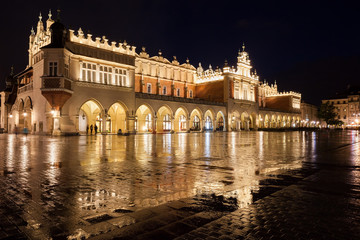 Fototapeta na wymiar Cloth Hall Illuminated At Night In Krakow