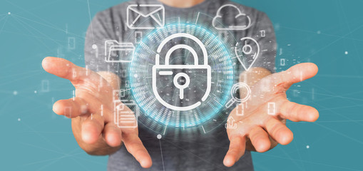 Businessman holding a Security padlock wheel icon with multimedia and social media icon 3d rendering