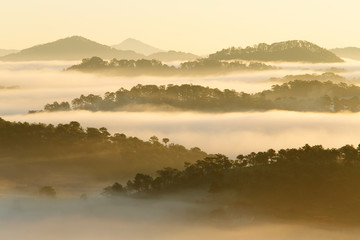 Misty mountain layer at dawn