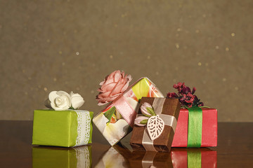 Beautiful gifts. Packed boxes. Expectation of the holiday. Surprise