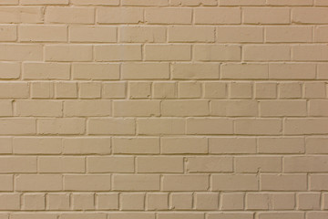 Beige brick wall background