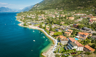 Fototapeta na wymiar Town of Malcesine on Lago di Garda skyline view, Veneto region of Italy. Aerial view, top view