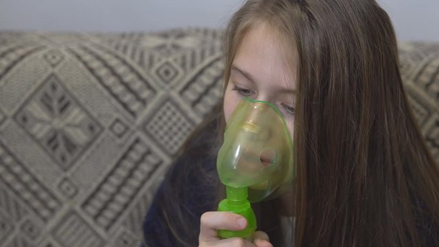 Girl makes an inhalation
