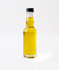 bottle of olive oil isolated on white