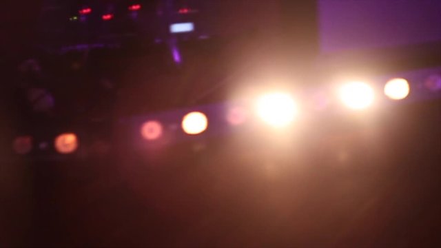 Strip lights sparkle on stage