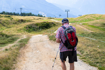 Senior hiker on a trail in the Swiss Alps, Bettmeralp