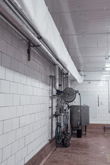 Flexible fabric or pvc like DuctSox ductwork installed in the clean facility. Milk processing plant.