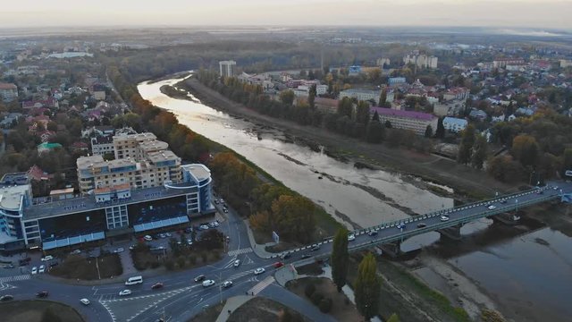 small town panoramic view from above in the autumn over the Uzh River during the sunset Uzhhorod Ukraine Europe