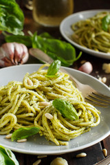 Spaghetti pasta with pesto sauce