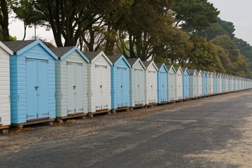 Fototapeta na wymiar beach huts in the UK