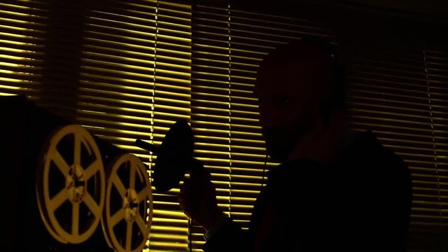 Special agent scout listens to conversations and makes a record on the tape5