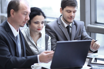 group of business people working on laptop in the office.