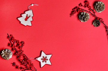 Top view of handmade Christmas decoration on red background