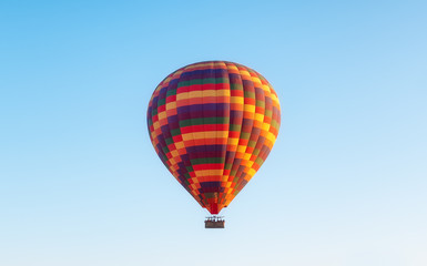 Airballoon in Turkey, Cappadocia. Travel and leisure. Adventure in the air. Concept and idea of adventure. Airballoon on the sky background