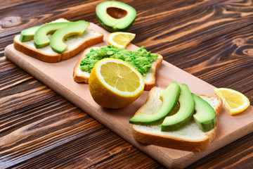 Avocado sandwich on a bread made with fresh sliced avocados from above