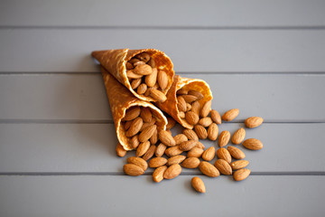 Ice cream cones filled with almond. Healthy lifestyle concept.