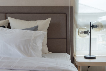 white pillows on bed in modern bedroom