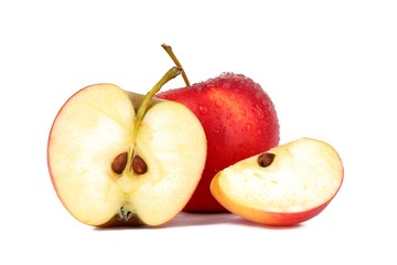 Red ripe apple  with a apple piece isolated on white