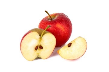 Naklejka na ściany i meble Red ripe apple with a apple piece isolated on white