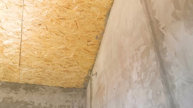 Rough finish with osb ceiling. Concrete walls.