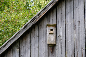 old wooden barn details in countryside at summer