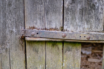old wooden barn details in countryside at summer