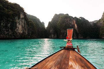 Old wooden boat on Asian Islands. Asian Islands. Thai Phi Phi Islands. Thai wooden boat. Boat in...