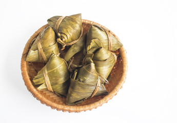 Vietnamese traditional food for may 5th, is double five festival or tet doan ngo, sticky rice cake in green leaf, also call banh u tro with pyramidal shape © Nguyen