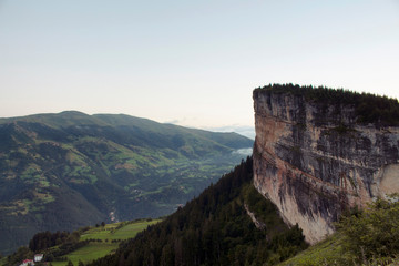 Fototapeta na wymiar View of a big rock on top of a mountain, valley, trees and beautiful nature. The image is captured in Trabzon/Rize area of Black Sea region located at northeast of Turkey.