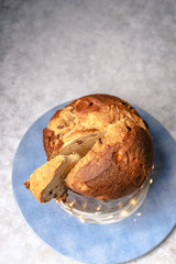 Traditional Italian dessert for Christmas: panettone with raisins and citrus candies. Copy space 