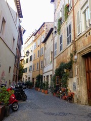 Fototapeta na wymiar Antica strada del centro storico di Roma in Italia.