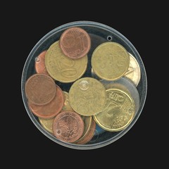 Euro coins in a plastic box piggy bank