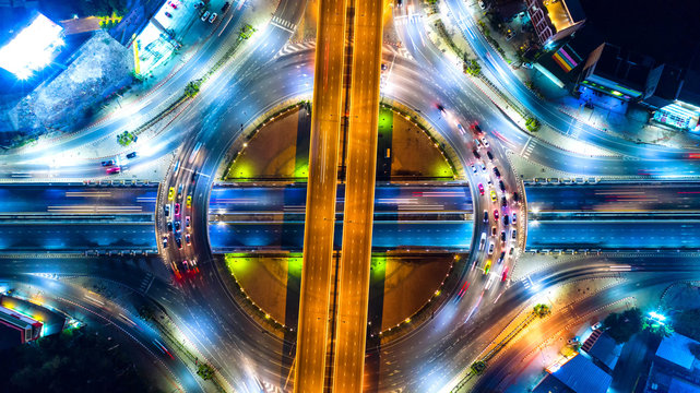 Aerial view and top view of traffic on city streets in bangkok , thailand. Expressway with car lots.